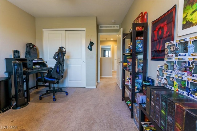 home office with baseboards, visible vents, and carpet