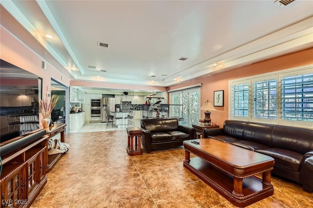 7165 Mira Monte Cir, Las Vegas, NV 89120 - living area with a tray ceiling and visible vents