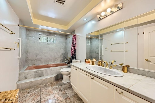 7165 Mira Monte Cir, Las Vegas, NV 89120 - bathroom featuring vanity, marble finish floor, tiled shower / bath combo, toilet, and visible vents