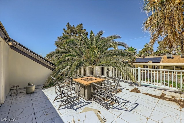 7165 Mira Monte Cir, Las Vegas, NV 89120 - view of patio / terrace with an outdoor fire pit