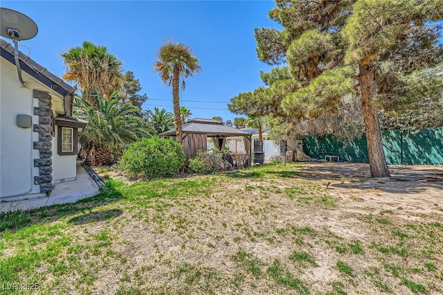 7165 Mira Monte Cir, Las Vegas, NV 89120 - view of yard featuring fence and a gazebo