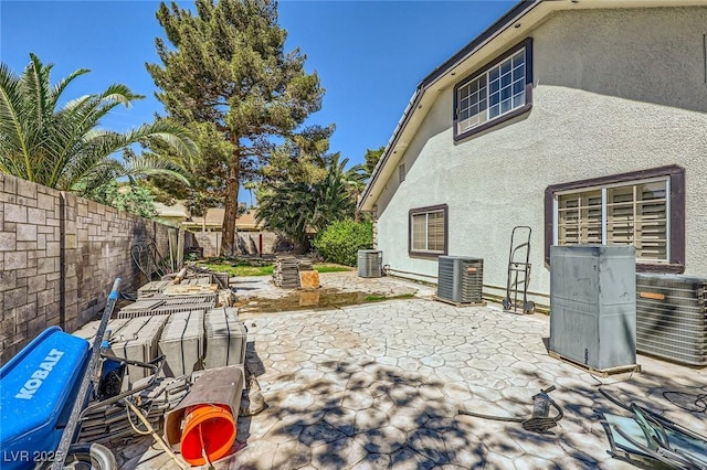 7165 Mira Monte Cir, Las Vegas, NV 89120 - view of patio featuring a fenced backyard and central AC unit
