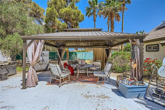 7165 Mira Monte Cir, Las Vegas, NV 89120 - view of patio / terrace featuring a gazebo and outdoor dining space
