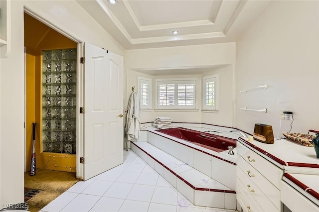 7165 Mira Monte Cir, Las Vegas, NV 89120 - full bath with a tray ceiling, a garden tub, and tile patterned floors