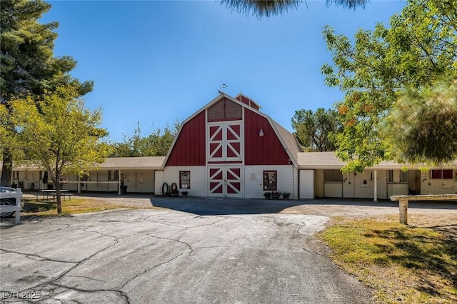 7165 Mira Monte Cir, Las Vegas, NV 89120 - view of barn featuring aphalt driveway