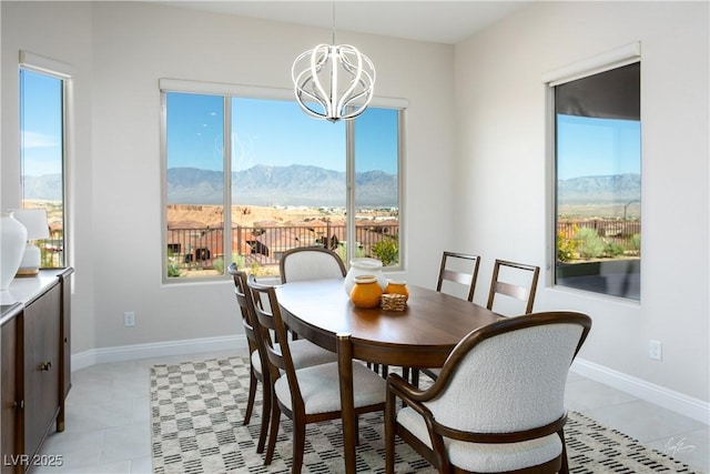 1130 Calico Rdg, Mesquite, NV 89034 - dining area featuring a chandelier, a mountain view, and light tile patterned floors