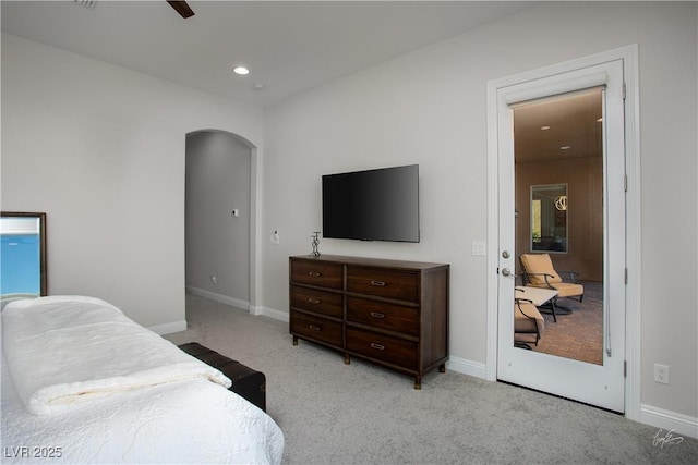 1130 Calico Rdg, Mesquite, NV 89034 - bedroom featuring arched walkways, light carpet, and recessed lighting