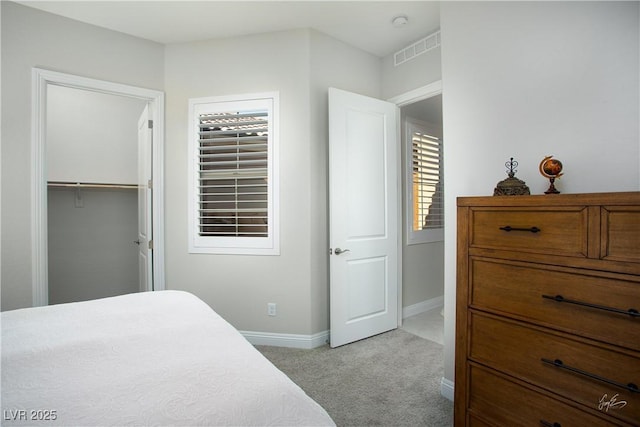 1130 Calico Rdg, Mesquite, NV 89034 - bedroom with light carpet and baseboards