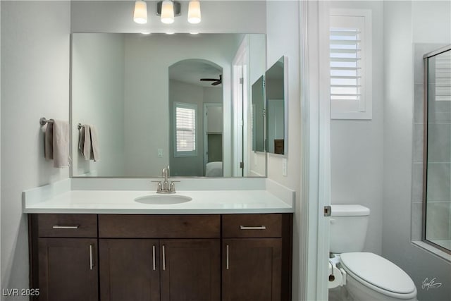 1130 Calico Rdg, Mesquite, NV 89034 - full bath with ceiling fan, vanity, and an enclosed shower