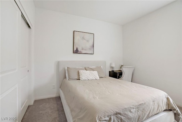 5692 Tinar St, Las Vegas, NV 89113 - bedroom with baseboards, carpet floors, and a closet