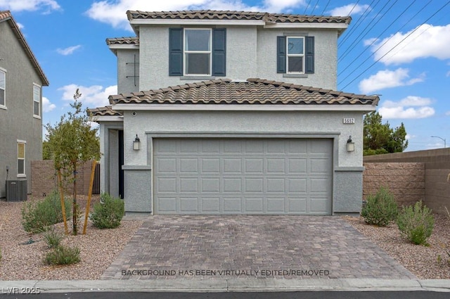 5692 Tinar St, Las Vegas, NV 89113 - traditional home with stucco siding, a tile roof, fence, and a garage