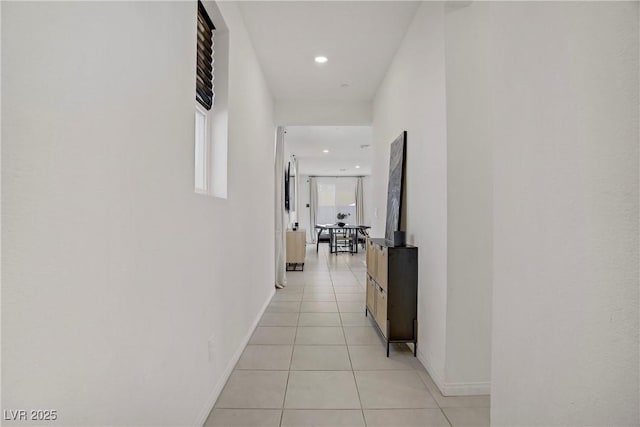 5692 Tinar St, Las Vegas, NV 89113 - corridor featuring light tile patterned floors, recessed lighting, and baseboards