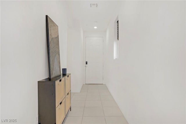5692 Tinar St, Las Vegas, NV 89113 - hall with visible vents, recessed lighting, and light tile patterned floors
