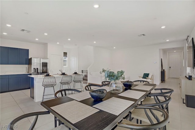 5692 Tinar St, Las Vegas, NV 89113 - dining area with recessed lighting, visible vents, and light tile patterned floors