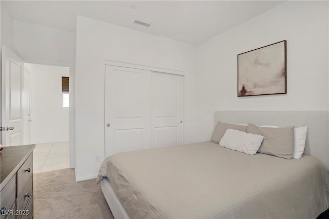 5692 Tinar St, Las Vegas, NV 89113 - bedroom with light carpet and a closet