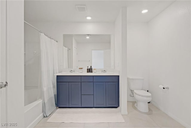 5692 Tinar St, Las Vegas, NV 89113 - bathroom featuring double vanity, tile patterned floors, toilet, and a sink
