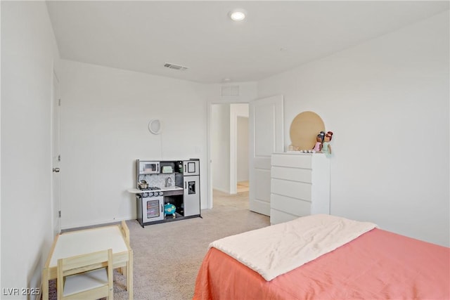 5692 Tinar St, Las Vegas, NV 89113 - bedroom with recessed lighting, visible vents, and light carpet