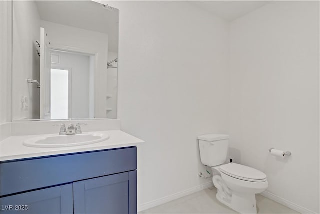 5692 Tinar St, Las Vegas, NV 89113 - bathroom featuring baseboards, tile patterned flooring, vanity, and toilet