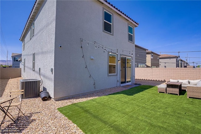 5692 Tinar St, Las Vegas, NV 89113 - back of property featuring central air condition unit, stucco siding, and an outdoor living space