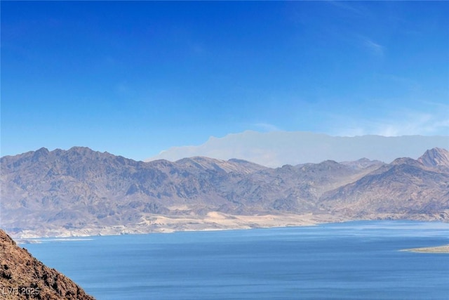mountain view featuring a water view