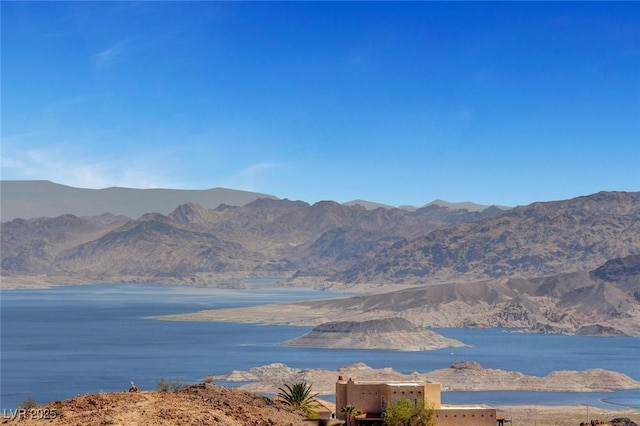 mountain view featuring a water view