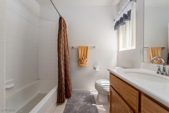 full bath featuring toilet, shower / tub combo with curtain, tile patterned floors, baseboards, and vanity