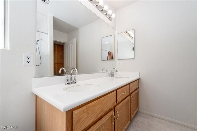 full bath featuring double vanity and a sink