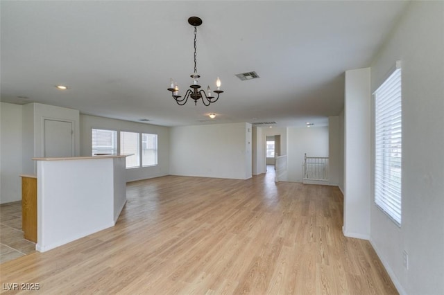 11668 Tierney Creek Dr, Las Vegas, NV 89183 - empty room featuring a chandelier, light wood finished floors, and recessed lighting