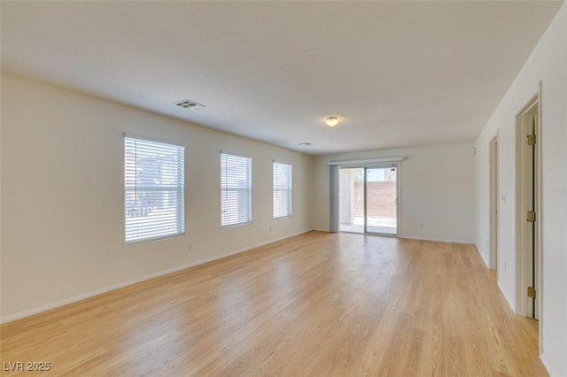 11668 Tierney Creek Dr, Las Vegas, NV 89183 - spare room featuring light wood finished floors and baseboards