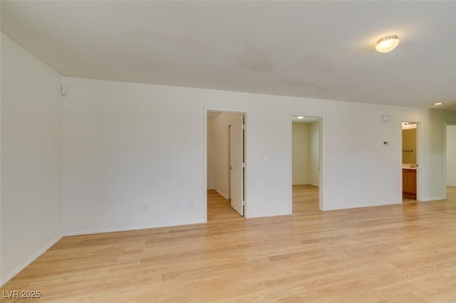11668 Tierney Creek Dr, Las Vegas, NV 89183 - unfurnished room with light wood finished floors and baseboards