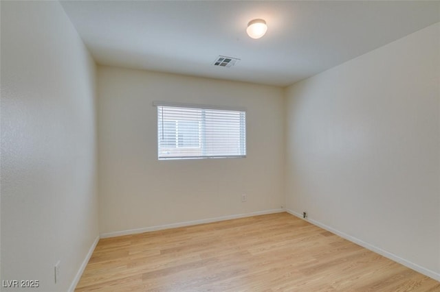 11668 Tierney Creek Dr, Las Vegas, NV 89183 - spare room with light wood finished floors and baseboards