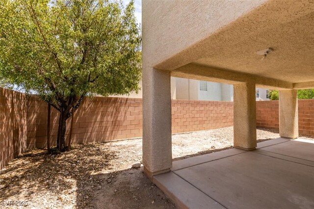 11668 Tierney Creek Dr, Las Vegas, NV 89183 - view of patio featuring a fenced backyard