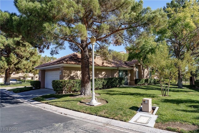 obstructed view of property with a tile roof, a front lawn, concrete driveway, a garage, and stucco siding