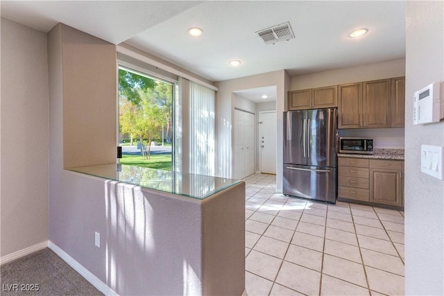 kitchen with light tile patterned floors, visible vents, recessed lighting, and appliances with stainless steel finishes