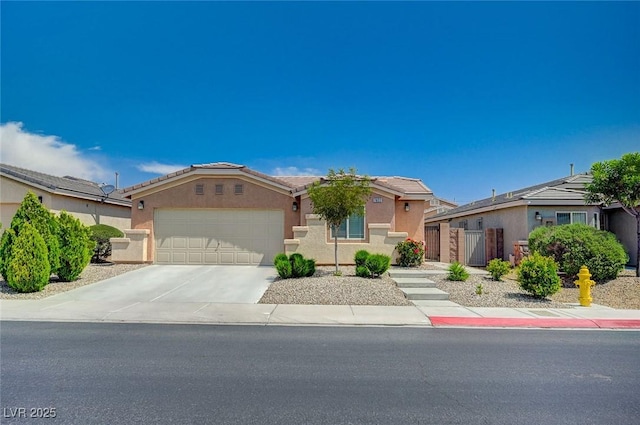 7822 Whitlocks Mill Ave, Las Vegas, NV 89147 - view of front of house featuring stucco siding, a garage, and driveway