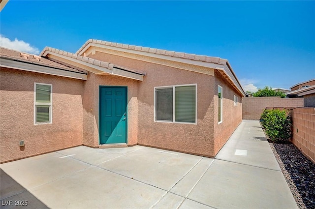 7822 Whitlocks Mill Ave, Las Vegas, NV 89147 - back of house with a fenced backyard, a patio, and stucco siding