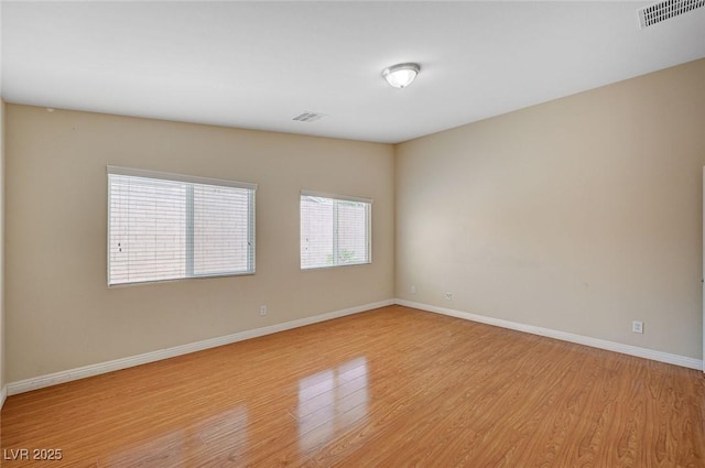7822 Whitlocks Mill Ave, Las Vegas, NV 89147 - unfurnished room featuring light wood finished floors and baseboards