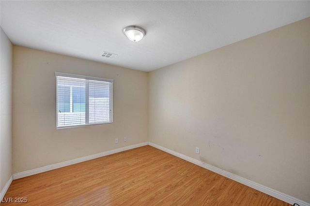 7822 Whitlocks Mill Ave, Las Vegas, NV 89147 - unfurnished room featuring light wood-type flooring and baseboards