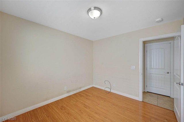 7822 Whitlocks Mill Ave, Las Vegas, NV 89147 - unfurnished room with light wood-type flooring, baseboards, and a smoke detector