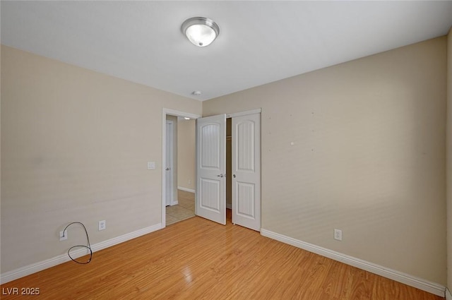 7822 Whitlocks Mill Ave, Las Vegas, NV 89147 - unfurnished room featuring baseboards and light wood finished floors