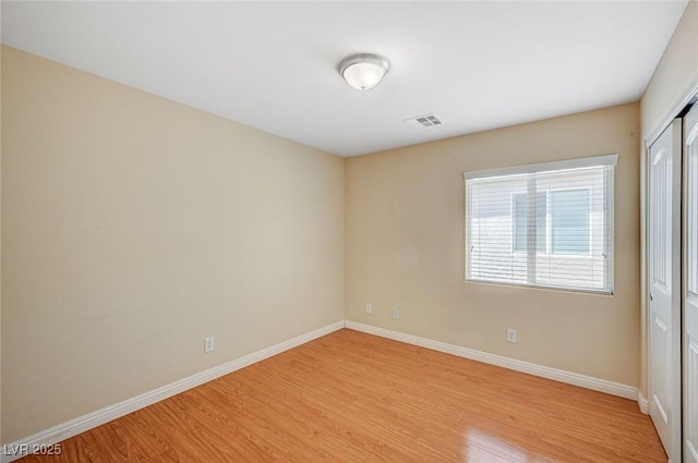 7822 Whitlocks Mill Ave, Las Vegas, NV 89147 - unfurnished room with light wood-style floors and baseboards