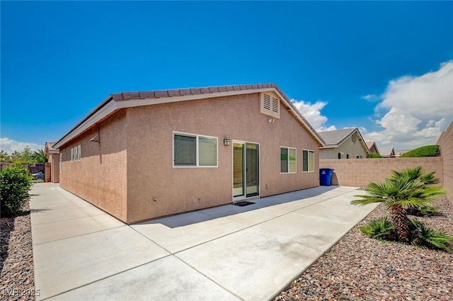 7822 Whitlocks Mill Ave, Las Vegas, NV 89147 - back of house featuring stucco siding and a patio area