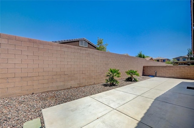 7822 Whitlocks Mill Ave, Las Vegas, NV 89147 - fenced backyard featuring a patio area