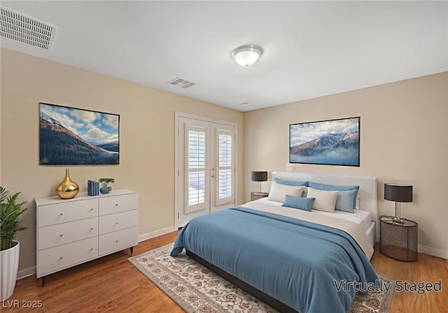 7822 Whitlocks Mill Ave, Las Vegas, NV 89147 - bedroom with wood finished floors, baseboards, access to outside, and french doors