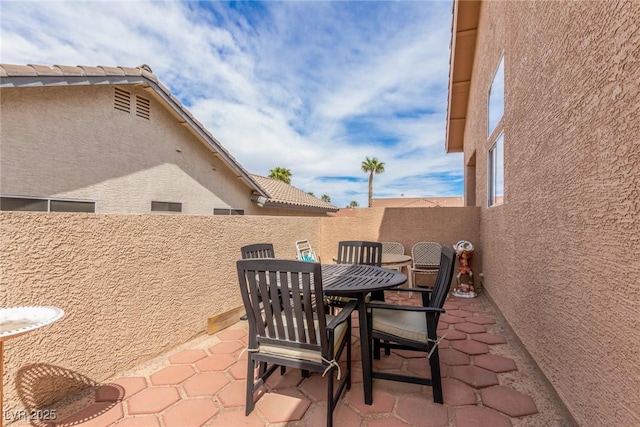 805 Blue Springs Dr, Henderson, NV 89002 - view of patio / terrace featuring a fenced backyard and outdoor dining area