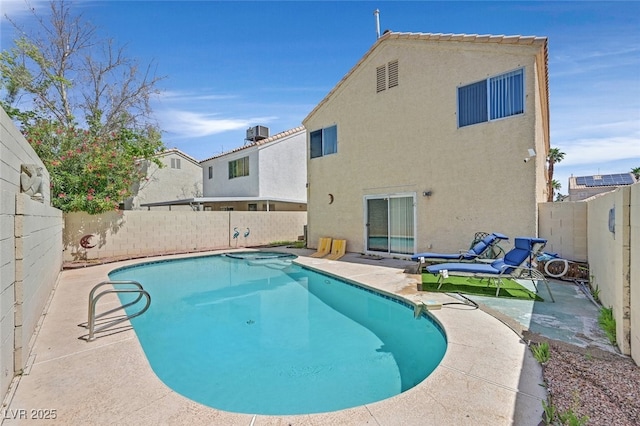 view of swimming pool featuring a patio area, a fenced backyard, and a fenced in pool
