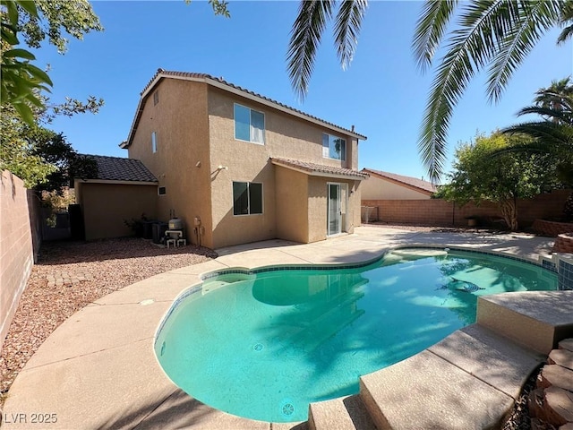 view of pool with a patio area, a fenced backyard, and a fenced in pool