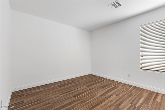283 Grand Olympia Dr, Henderson, NV 89012 - unfurnished room with wood finished floors and baseboards