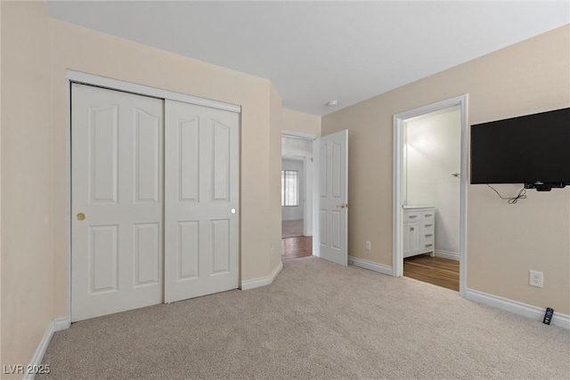 283 Grand Olympia Dr, Henderson, NV 89012 - unfurnished bedroom featuring carpet floors, a closet, baseboards, and ensuite bathroom