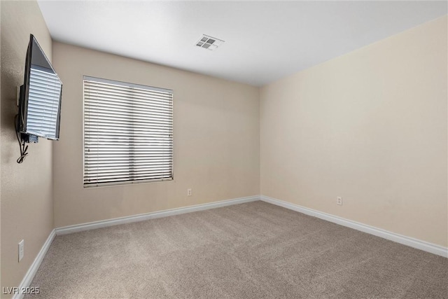283 Grand Olympia Dr, Henderson, NV 89012 - carpeted spare room featuring baseboards and healthy amount of natural light